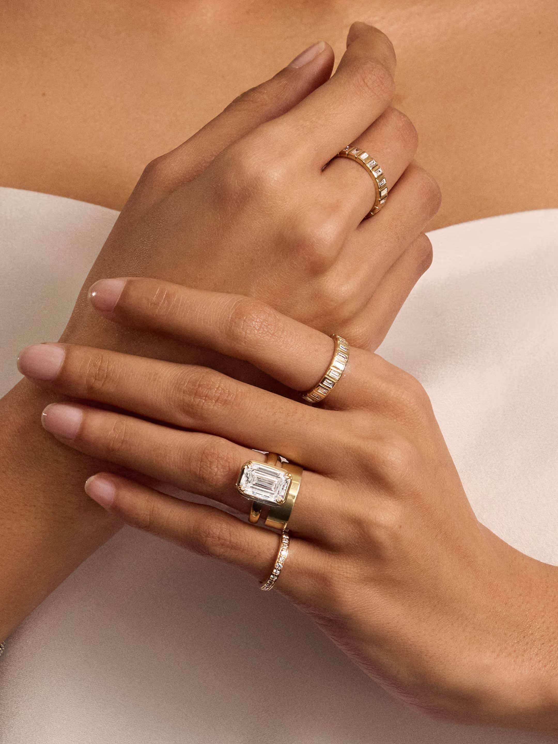 Engagement Rings showcase featuring a lifestyle image of an engagement ring, highlighting the collection's signature distinctive design elements against an elegant background