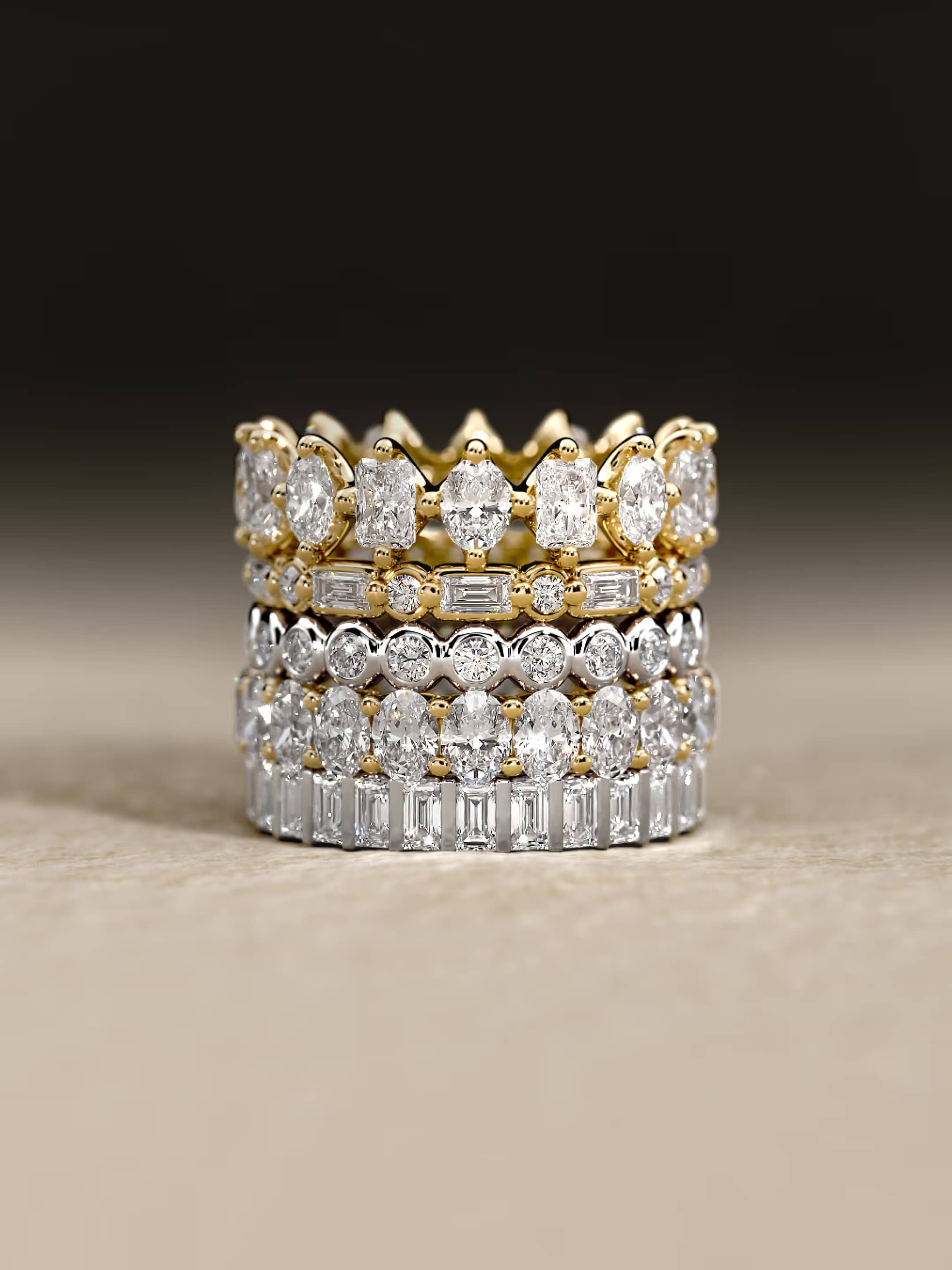 Wedding Bands showcase featuring a lifestyle image of an engagement ring, highlighting the collection's signature distinctive design elements against an elegant background