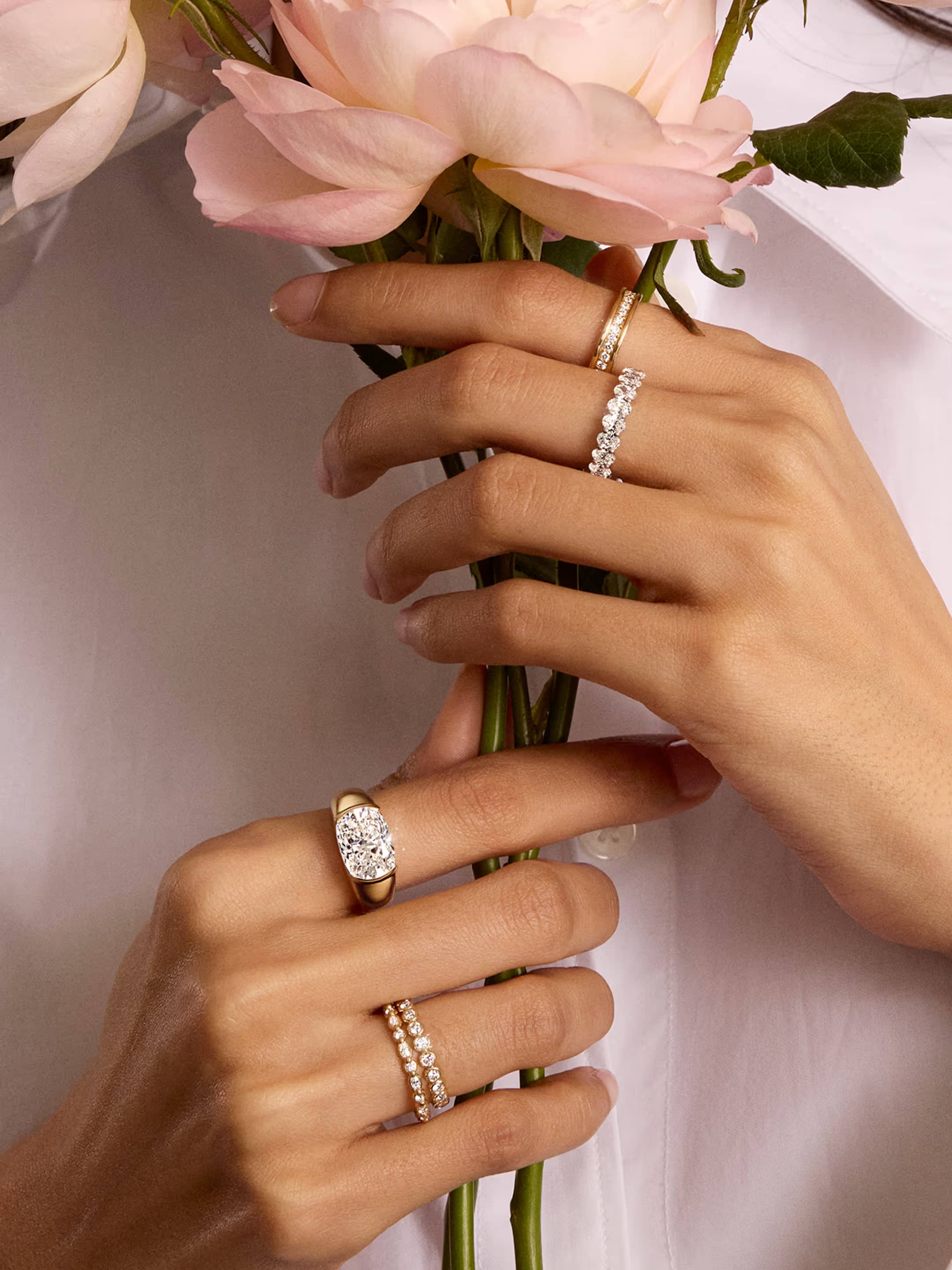 The Lunette Collection showcase featuring a lifestyle image of an engagement ring, highlighting the collection's signature modern and sleek design against an elegant background