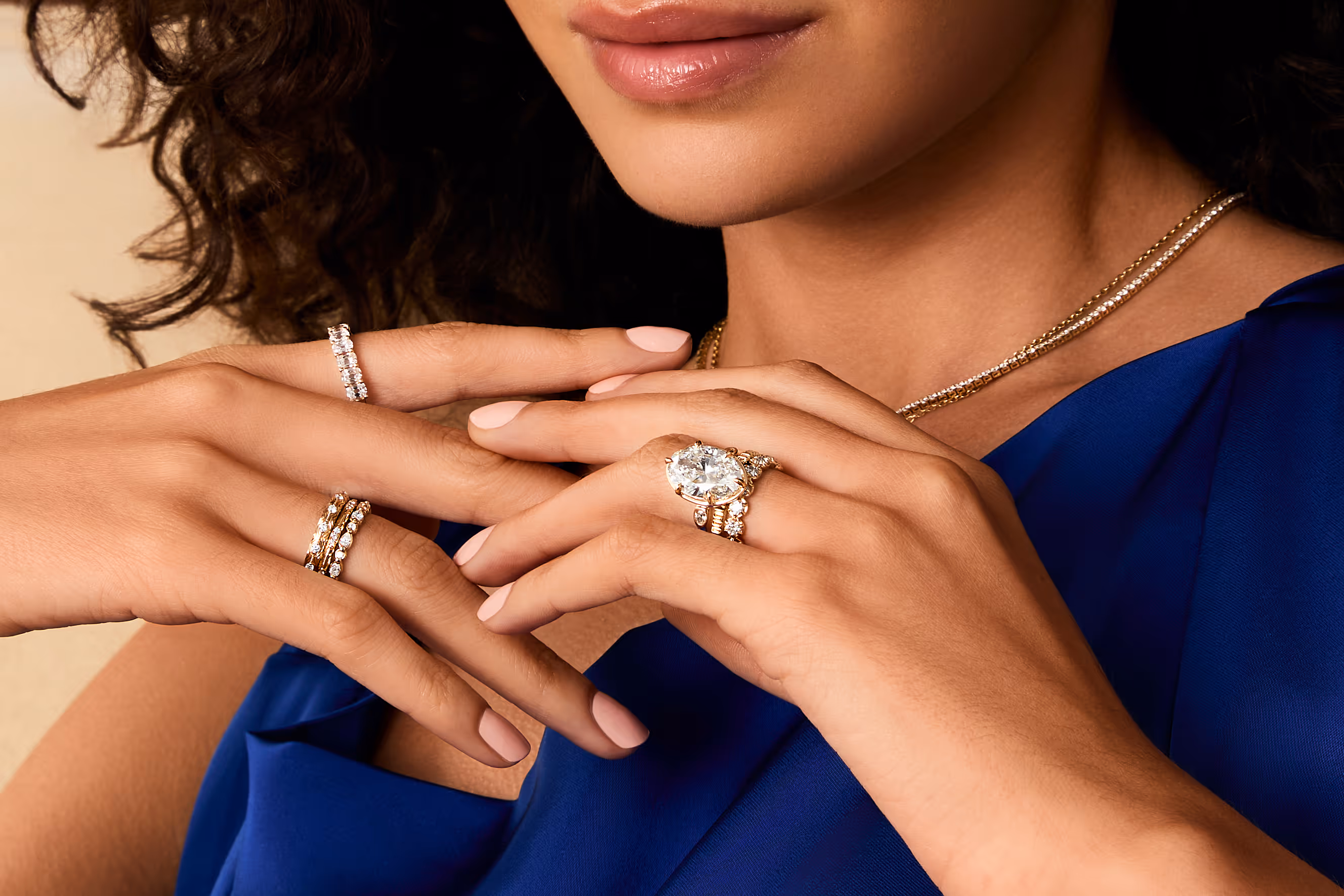 The Mare showcase featuring a lifestyle image of an engagement ring