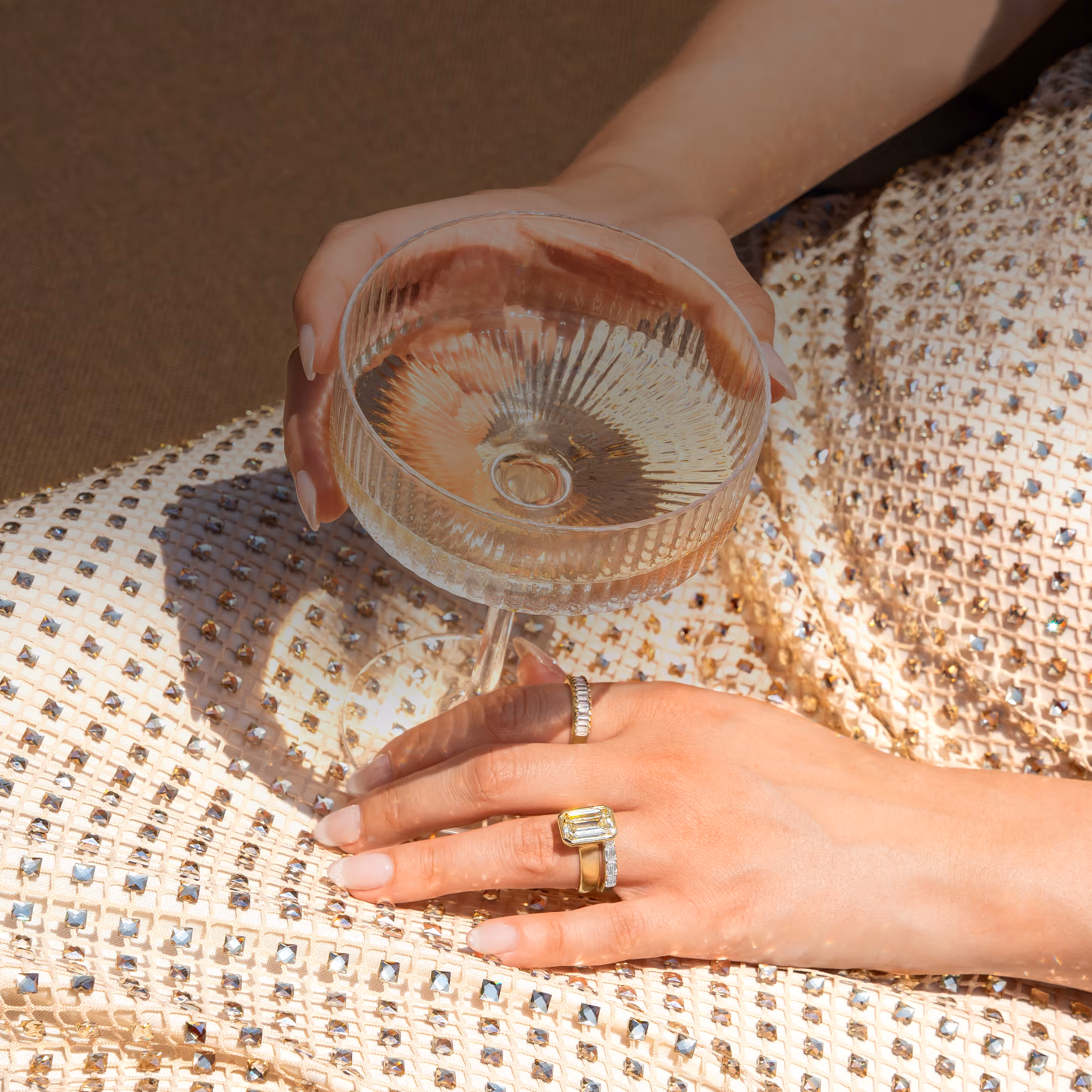 A close-up of an engagement ring with text overlay reading 'Find the Perfect Ring, Make it yours' against a dark background