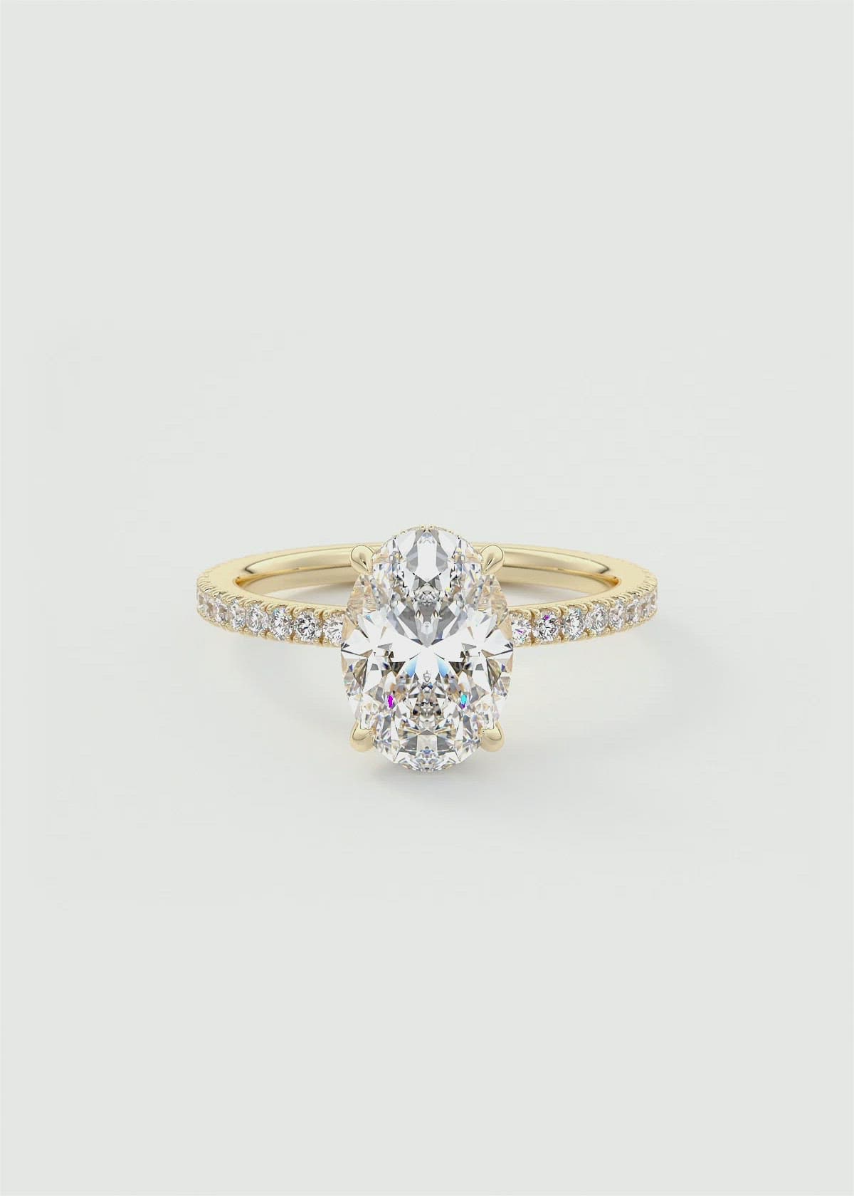 Oval Cut Hidden Halo Engagement Ring with Pavé by Frank Darling