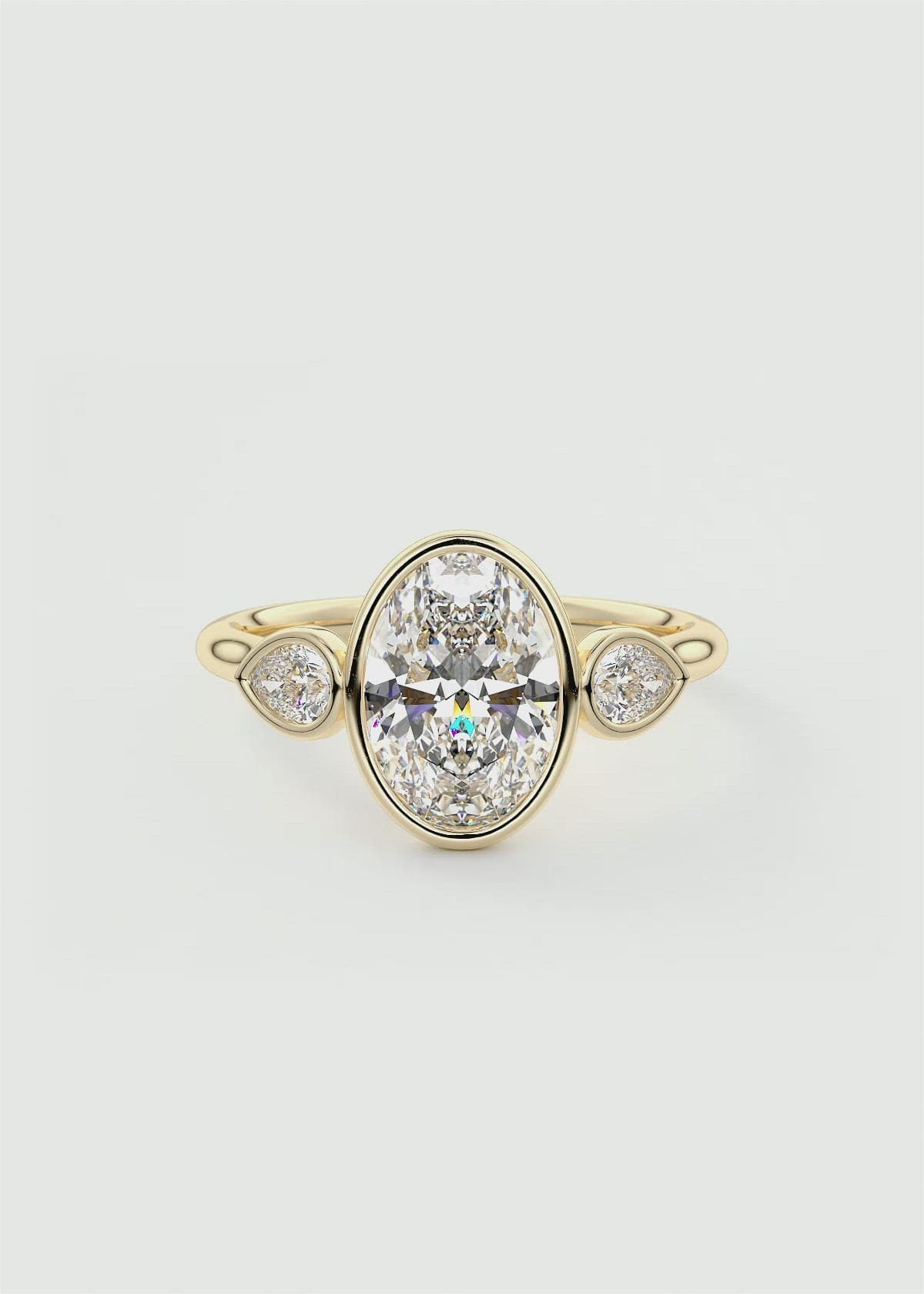 Bezel Set Oval Cut Three Stone Engagement Ring with Pears by Frank