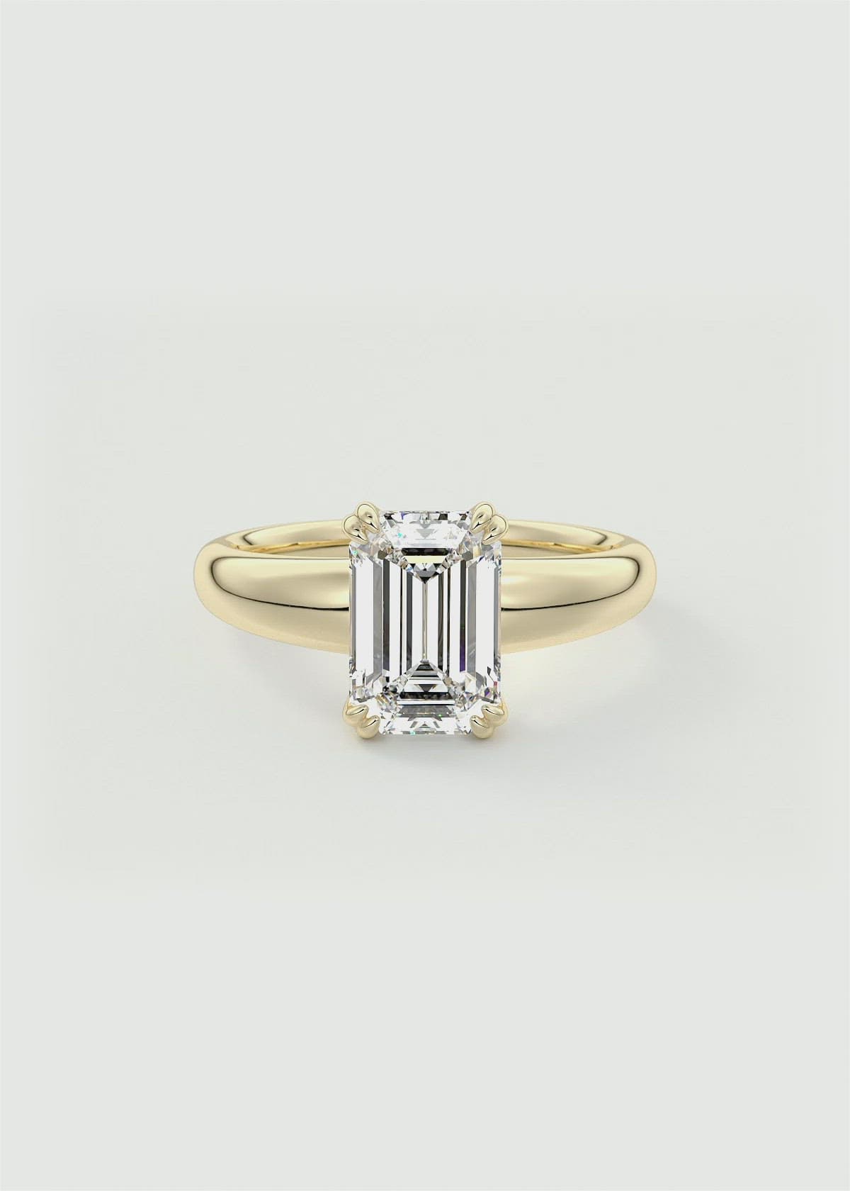 Domed Bombé Engagement Ring with Emerald Cut Diamond by Frank Darling